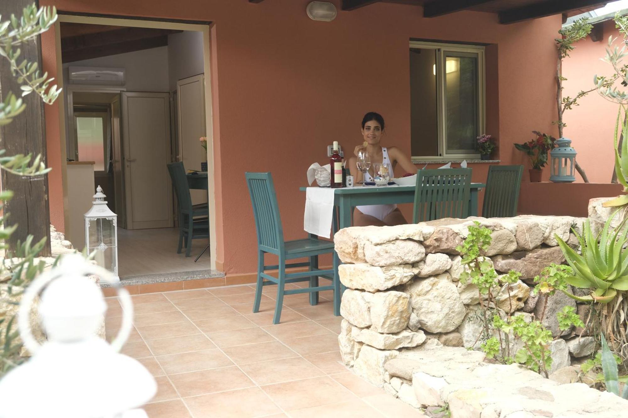 Villaggio Camping Torre Del Porticciolo Porto Conte Cameră foto